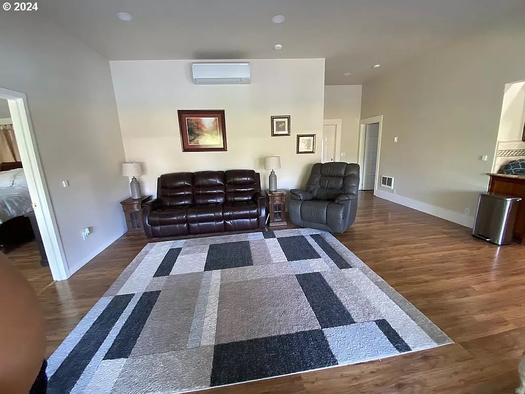 34036 Row River Road Cottage Grove, OR 97424 - Photo 7 of 15 a living room with furniture and a rug