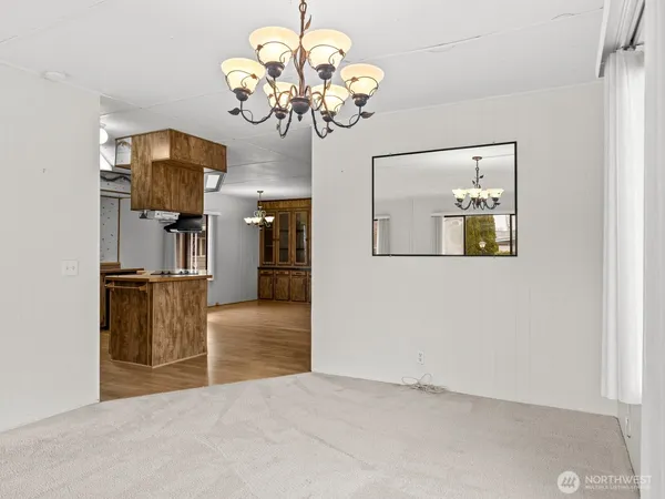 a kitchen with stainless steel appliances granite countertop a sink and a stove