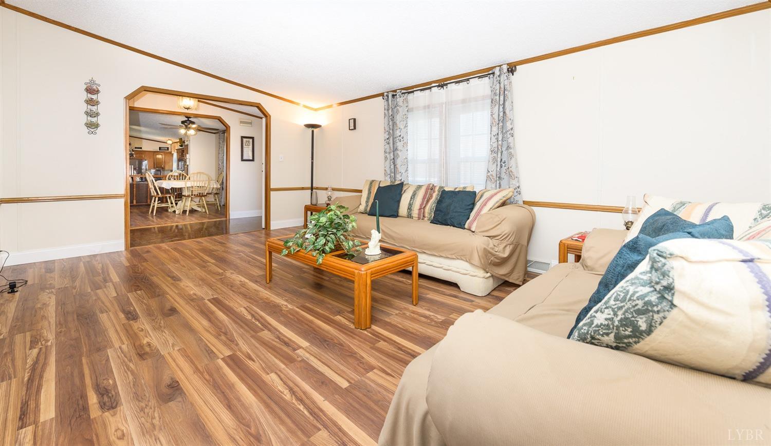 461 Byrd Mill Road Louisa, VA 23093 - Photo 35 of 81 a living room with furniture and wooden floor