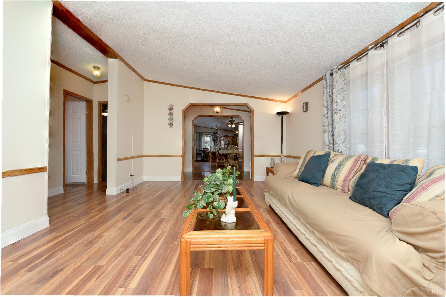 461 Byrd Mill Road Louisa, VA 23093 - Photo 7 of 81 a living room with furniture and a wooden floor