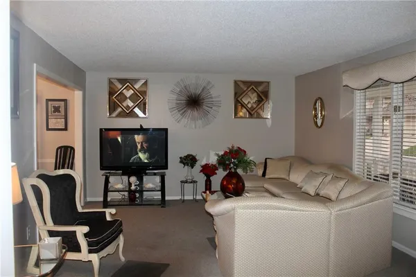 $405,000 | 617 Northeast Birchwood Drive, Lee's Summit, MO 64086