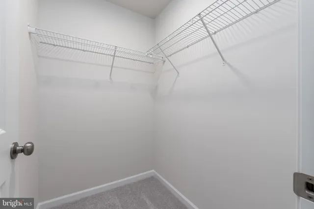 a view of a room with racks on the wall