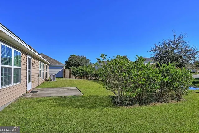 a utility room with a sink dryer and washer