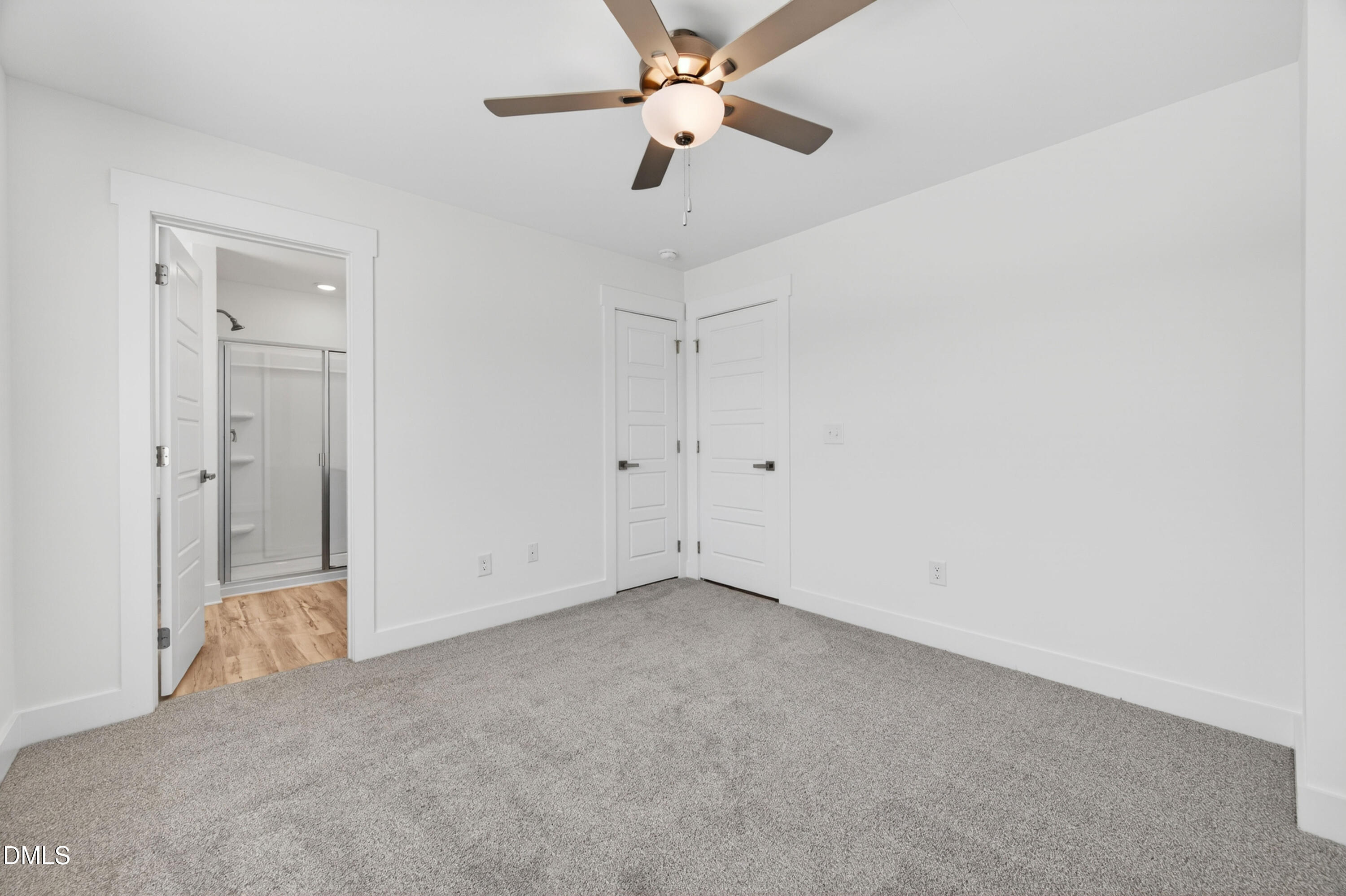 1256 Hurdle Mills Road Roxboro, NC 27573 - Photo 35 of 48 an empty room with a ceiling fan and a window