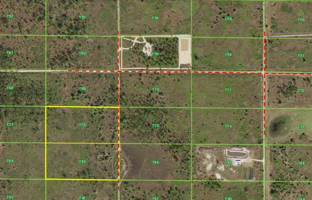 50530 Bermont Road Punta Gorda, FL 33982 - Photo 3 of 21 a bathroom with a glass shower door