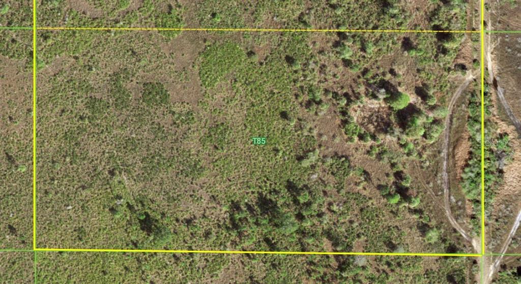 50530 Bermont Road Punta Gorda, FL 33982 - Photo 6 of 21 a small bathroom with a shower and a mirror