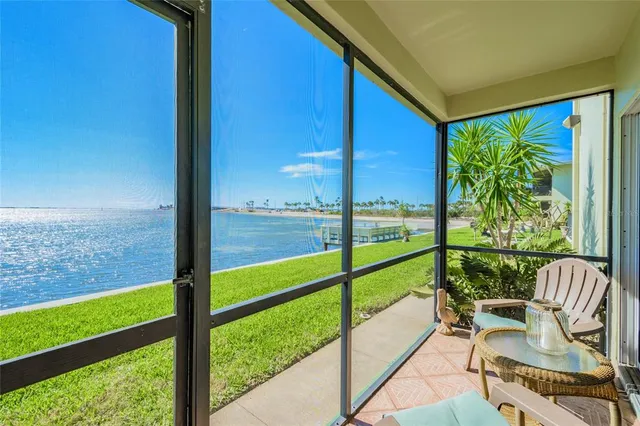 a view of a lake with a big yard