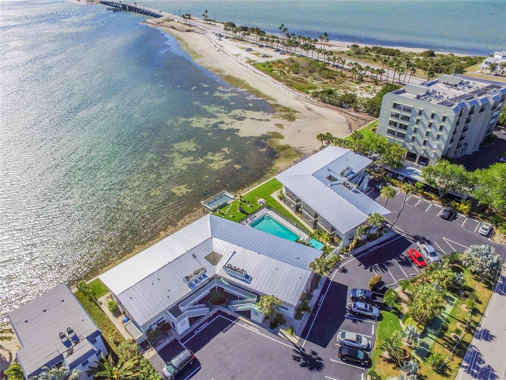 2570 Gary Circle, Unit 4 Dunedin, FL 34698 - Photo 5 of 20 an aerial view of a house with a yard