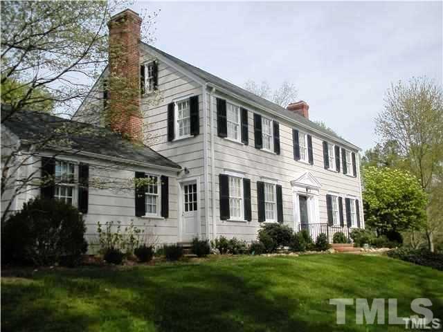 Front of classic 1938 Colonial Revival home on quiet street near UNC.