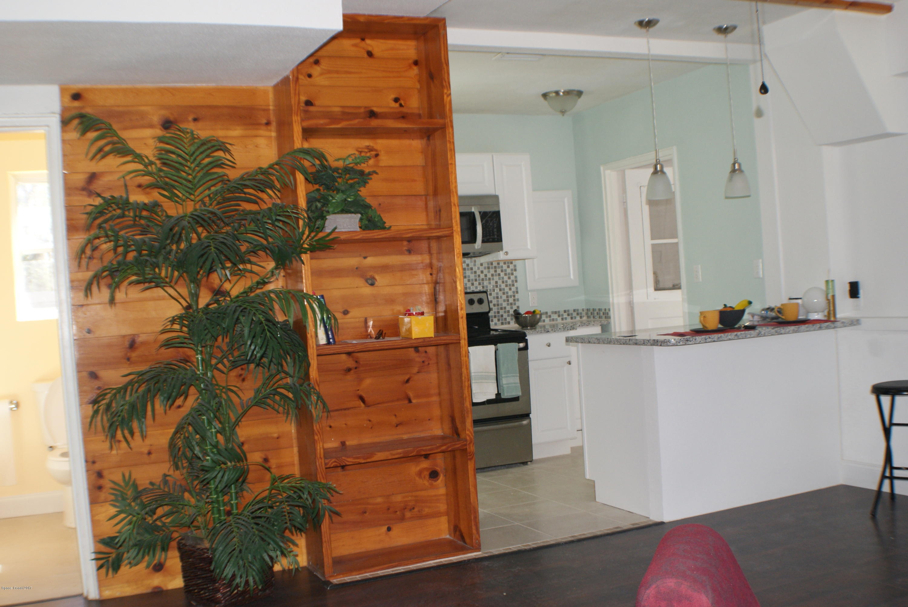 1007 Woodlawn Road Rockledge, FL 32955 - Photo 7 of 27 To kitchen