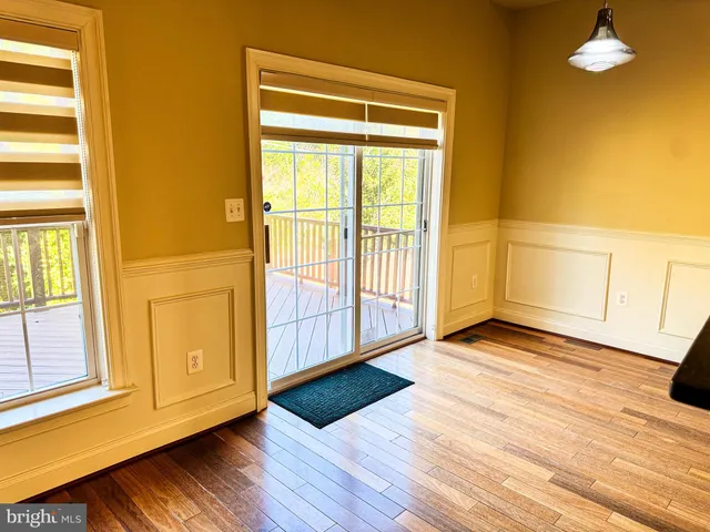 a kitchen with stainless steel appliances granite countertop a stove and a microwave