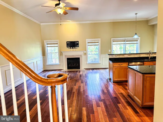 a view of front door with wooden floor