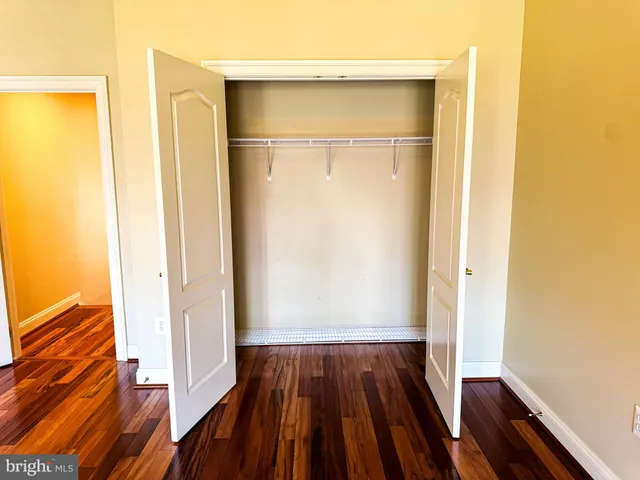 a view of front door with wooden floor