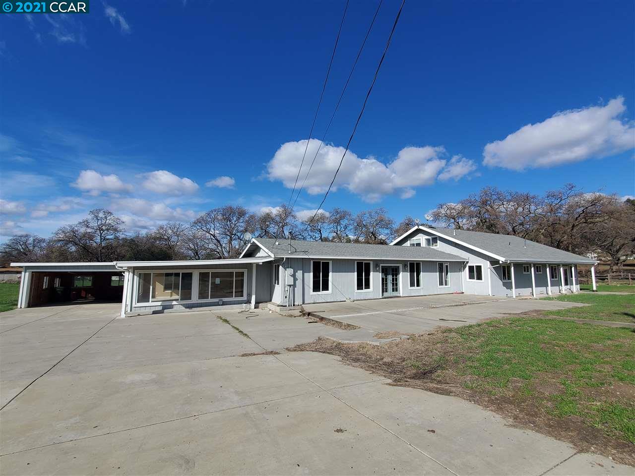 1250 North Gate Road Walnut Creek, CA 94598 - Photo 1 of 1 a view of a white house with a yard