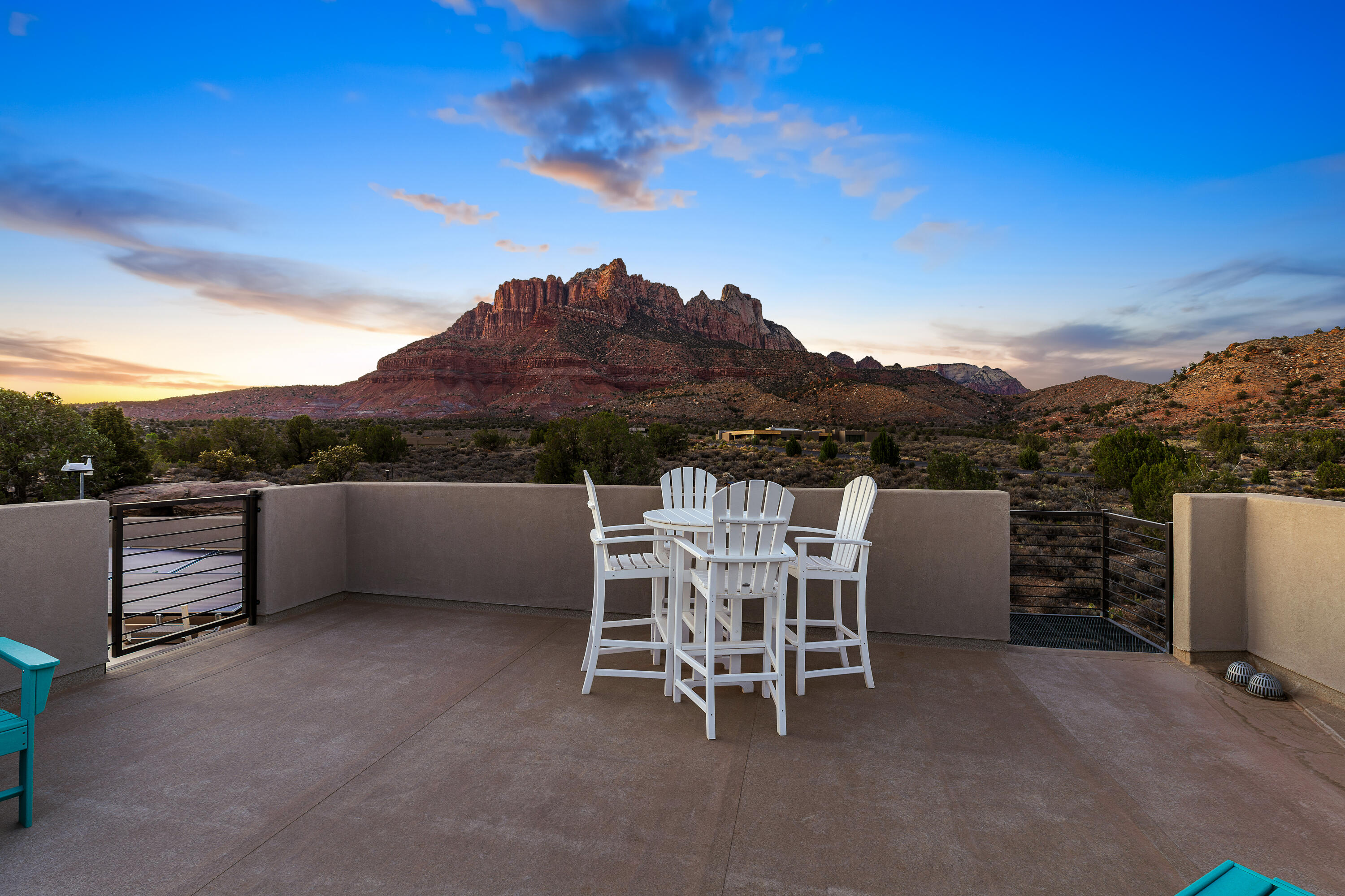 3000 Navajo Way Springdale, UT 84767 - Photo 51 of 63 Rooftop deck with dining and lounge seating and a full. 360-degree canyon vantage