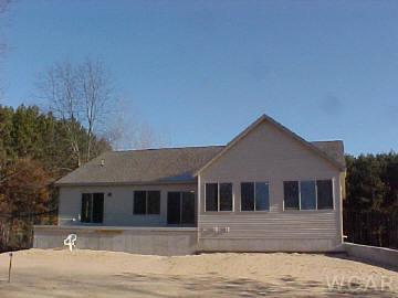 7547 River Ridge Road, Unit 19 Canadian Lakes, MI 49346 - Photo 1 of 1 Primary Photo