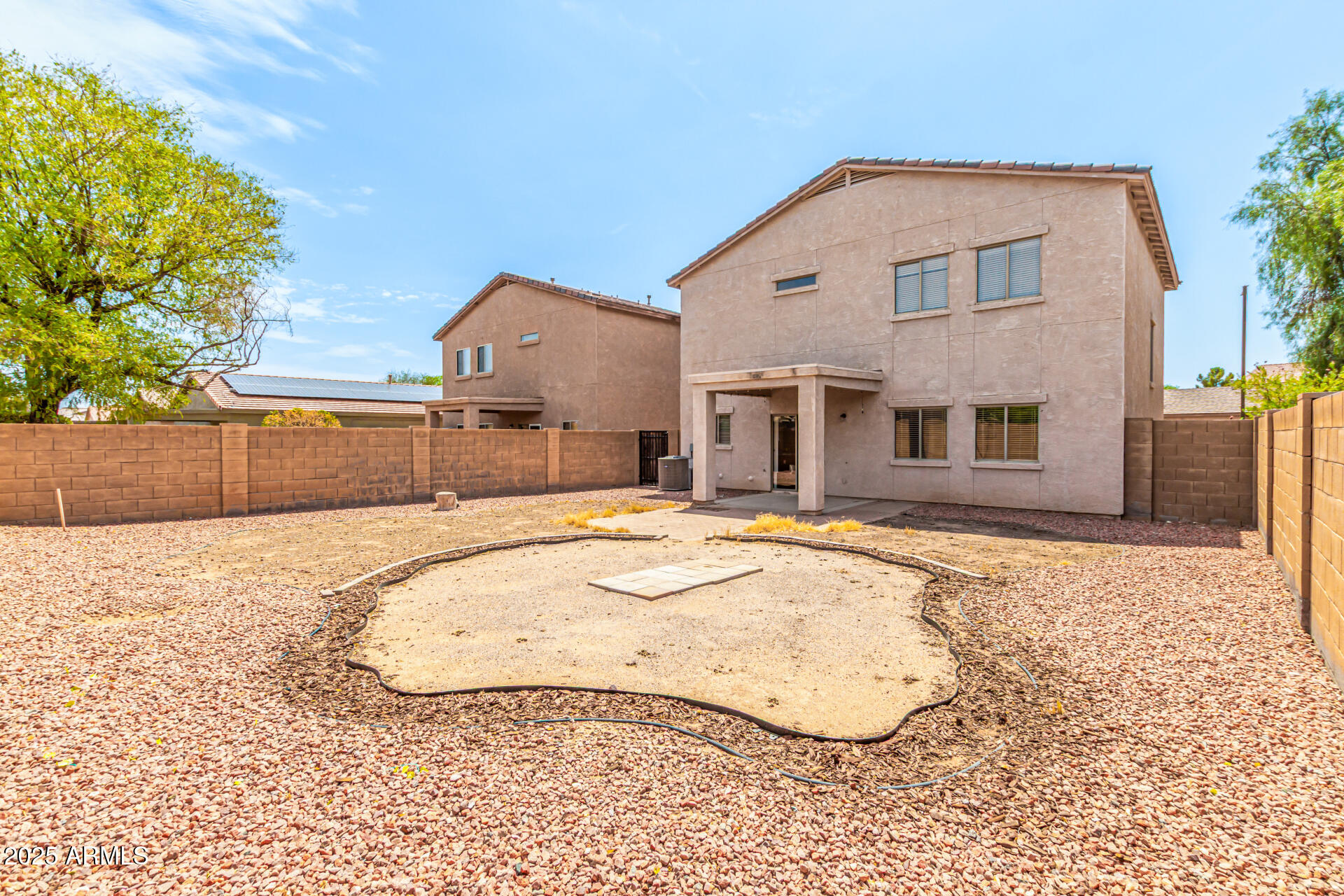 16890 West Rimrock Street Surprise, AZ 85388 - Photo 27 of 28 a front view of a house with a yard