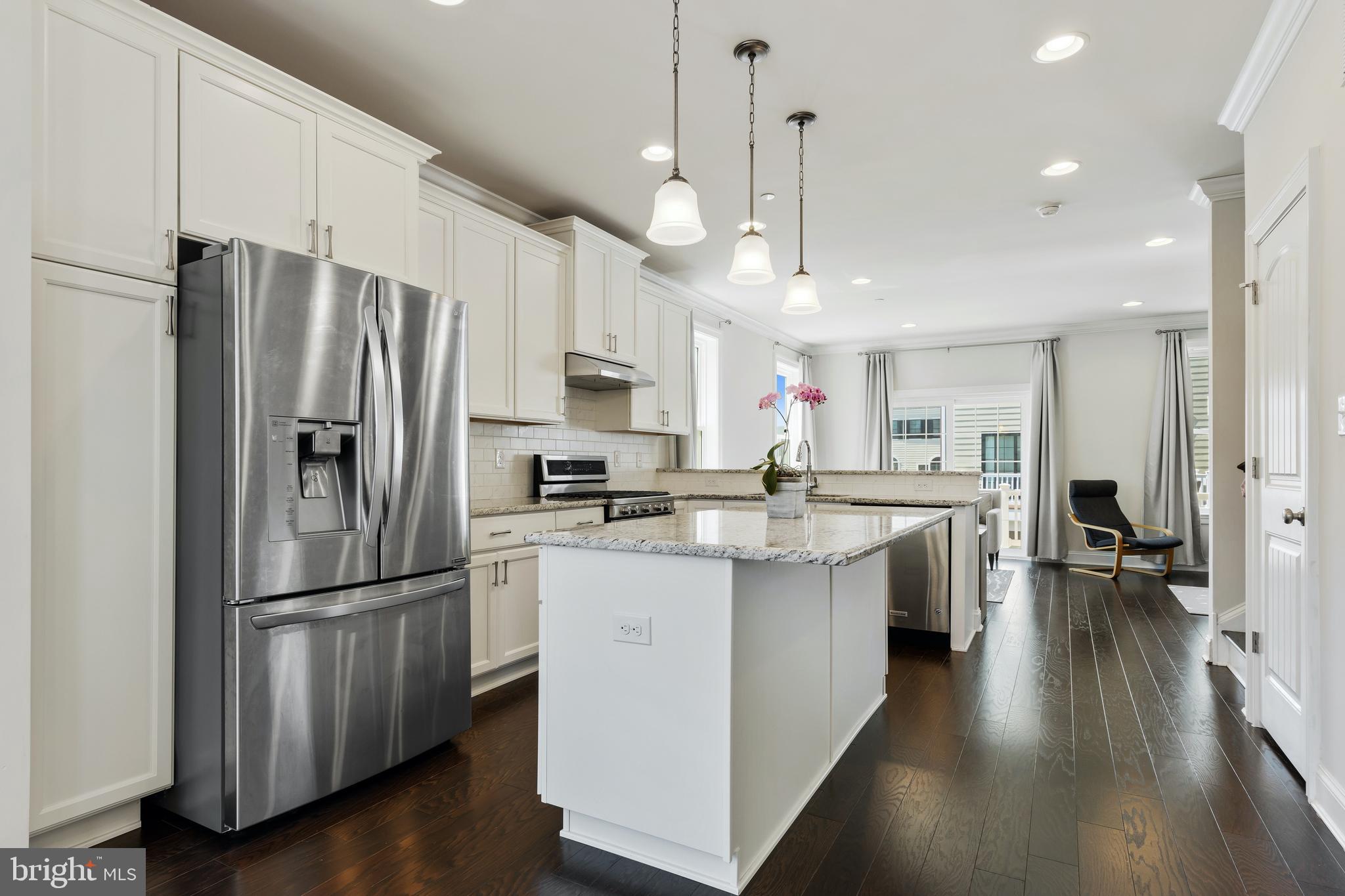 120 Tess Lane Wayne, PA 19087 - Photo 14 of 38 Kitchen island with breakfast bar seating