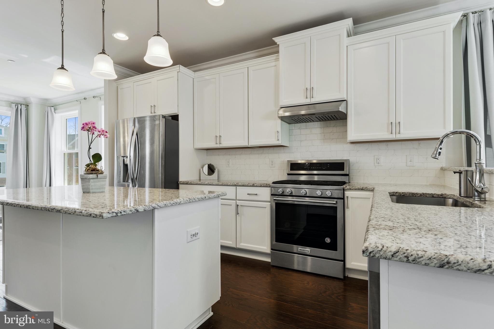 120 Tess Lane Wayne, PA 19087 - Photo 16 of 38 Gas Range with vented exhaust hood