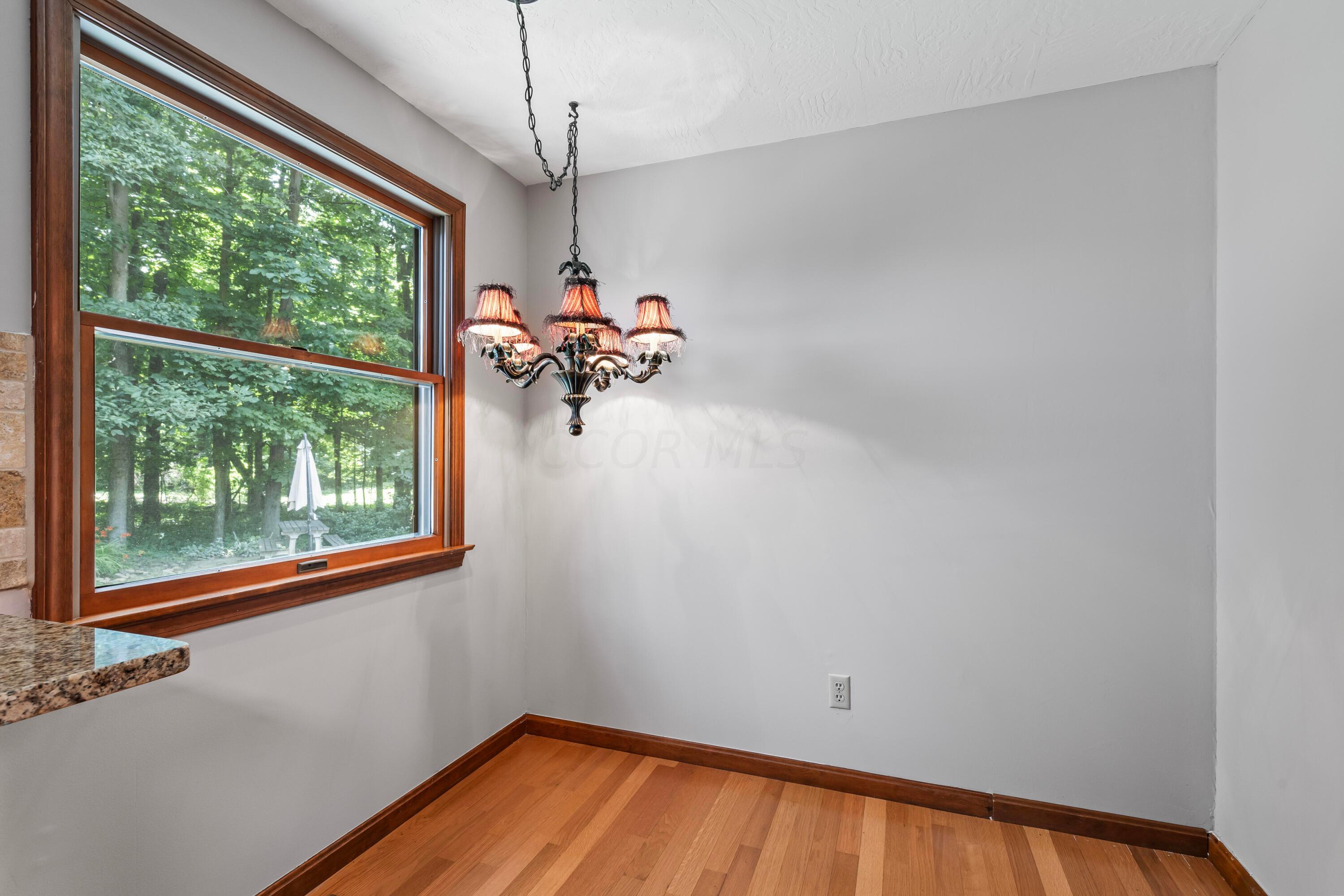 6940 Graham Road Mount Vernon, OH 43050 - Photo 18 of 70 • Hardwood flooring
• Ivory painted walls
• Chandelier