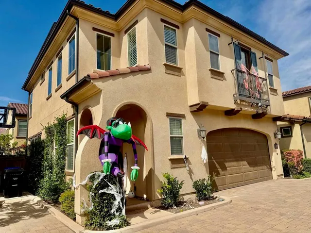 a room with wooden floor and furniture