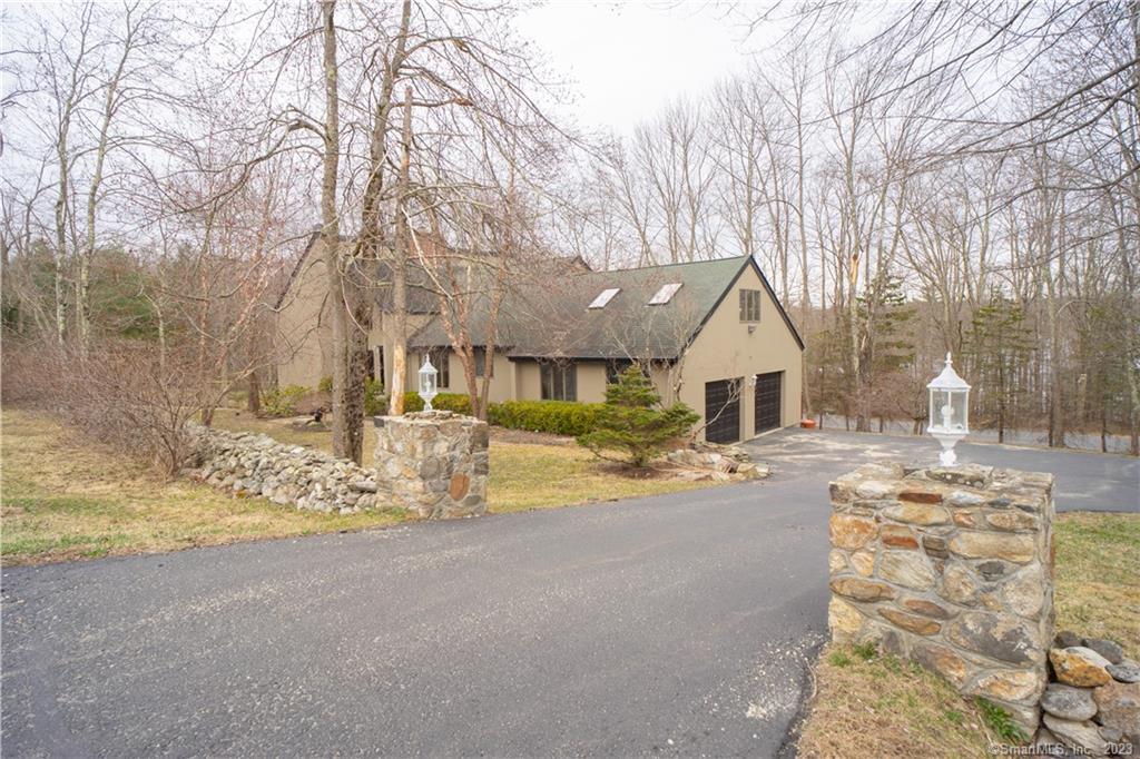80 Ives Road Goshen, CT 06756 - Photo 1 of 1 a view of a house with snow on the background
