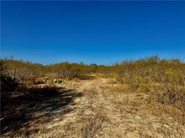 a view of mountain view with mountains in the background