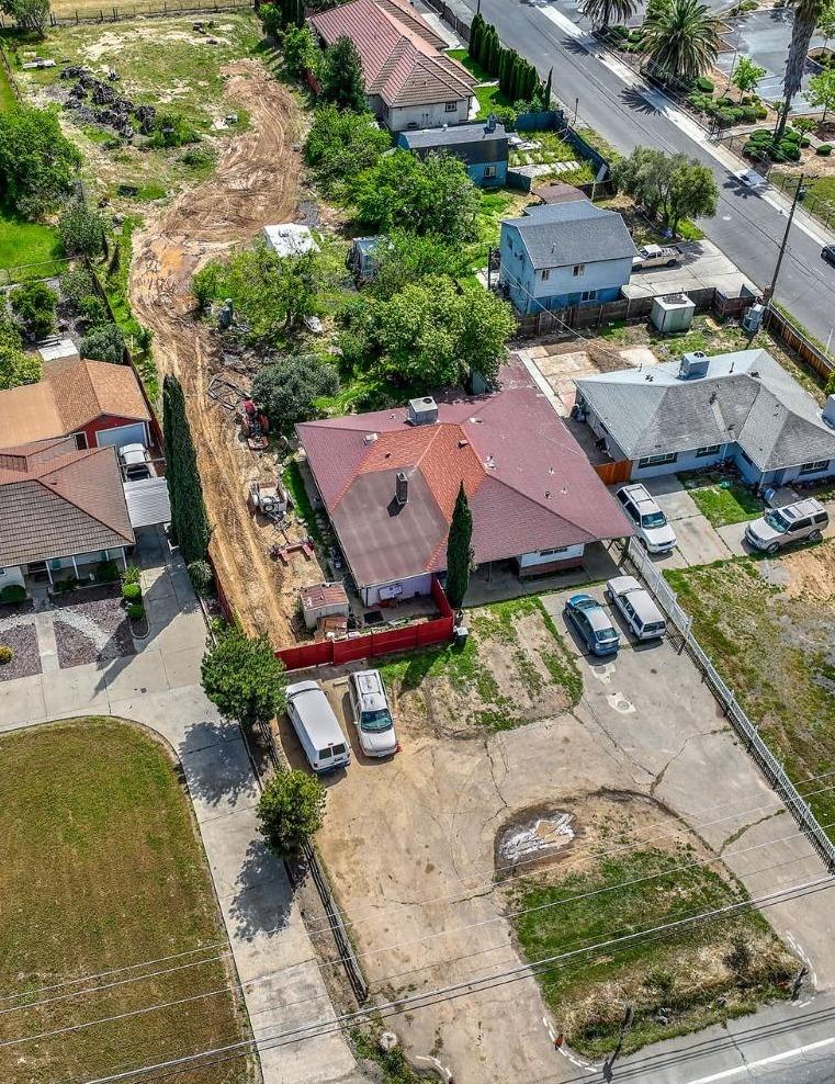 8758 Florin Road Sacramento, CA 95829 - Photo 2 of 14 an aerial view of a house with garden space and street view