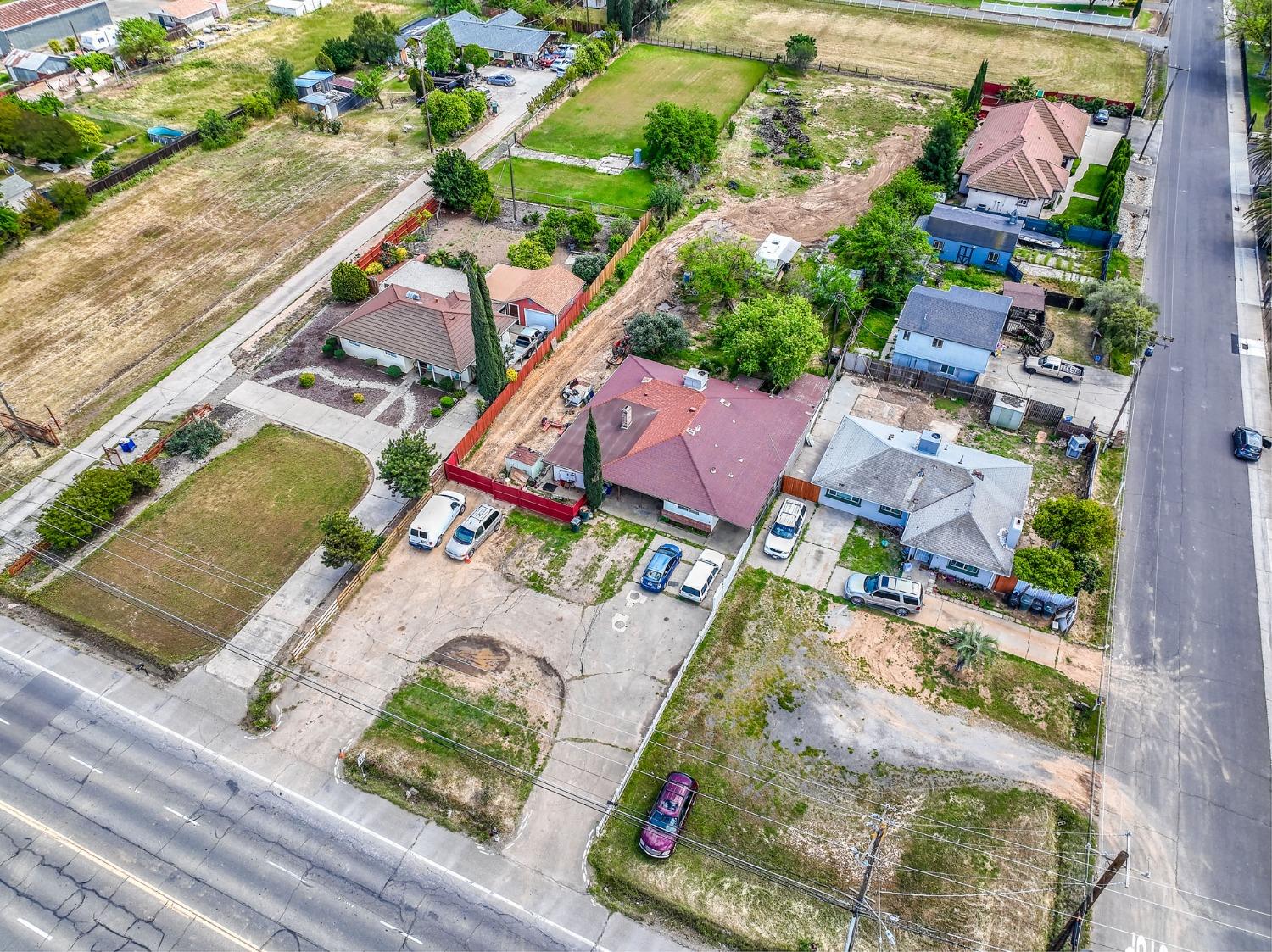 8758 Florin Road Sacramento, CA 95829 - Photo 3 of 14 an aerial view of residential houses with outdoor space