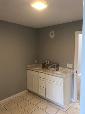Lot B Cutler Road Jefferson, MA 01522 - Photo 11 of 16 a bathroom with a granite countertop sink and a mirror