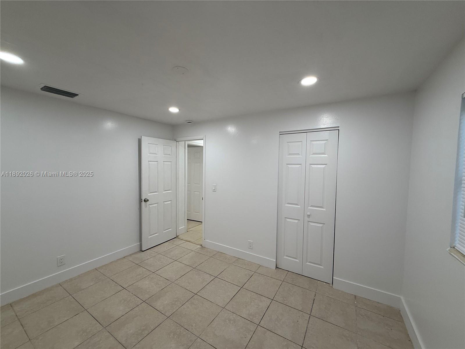 1600 West 14th Street Riviera Beach, FL 33404 - Photo 15 of 22 a view of an empty room