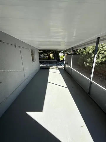 a view of hallway with stairs