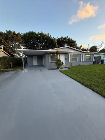 a view of a house with a garden