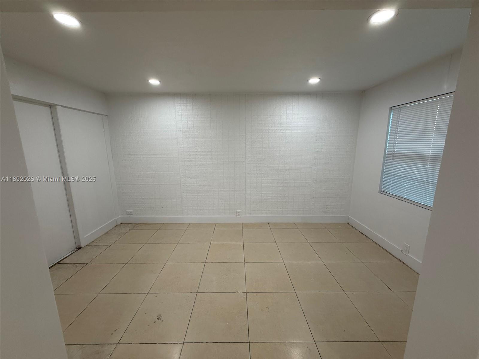 1600 West 14th Street Riviera Beach, FL 33404 - Photo 6 of 22 an empty room with a empty space and window