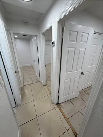 a view of a utility room with closet