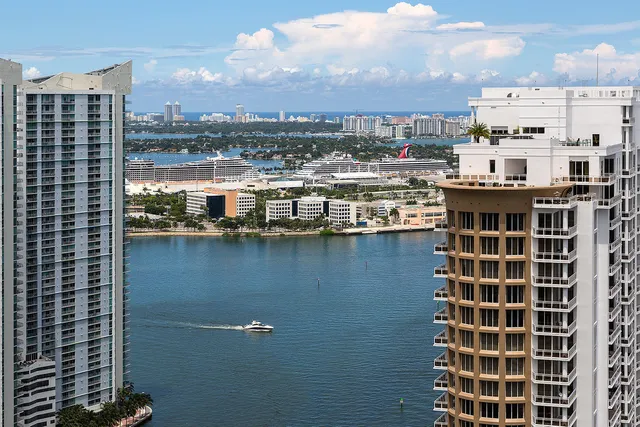 a view of balcony with wooden floor and windows
