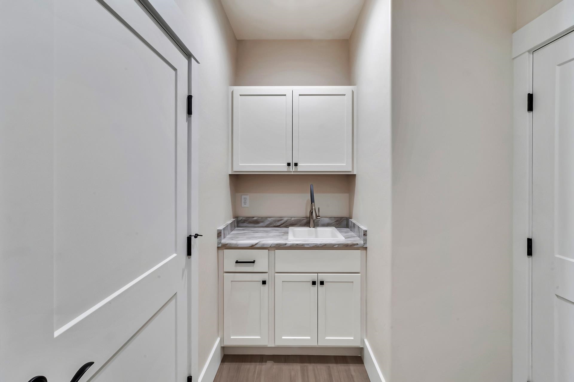 1024 Snowdrop Court Fruita, CO 81521 - Photo 11 of 23 a room with a sink and a stove