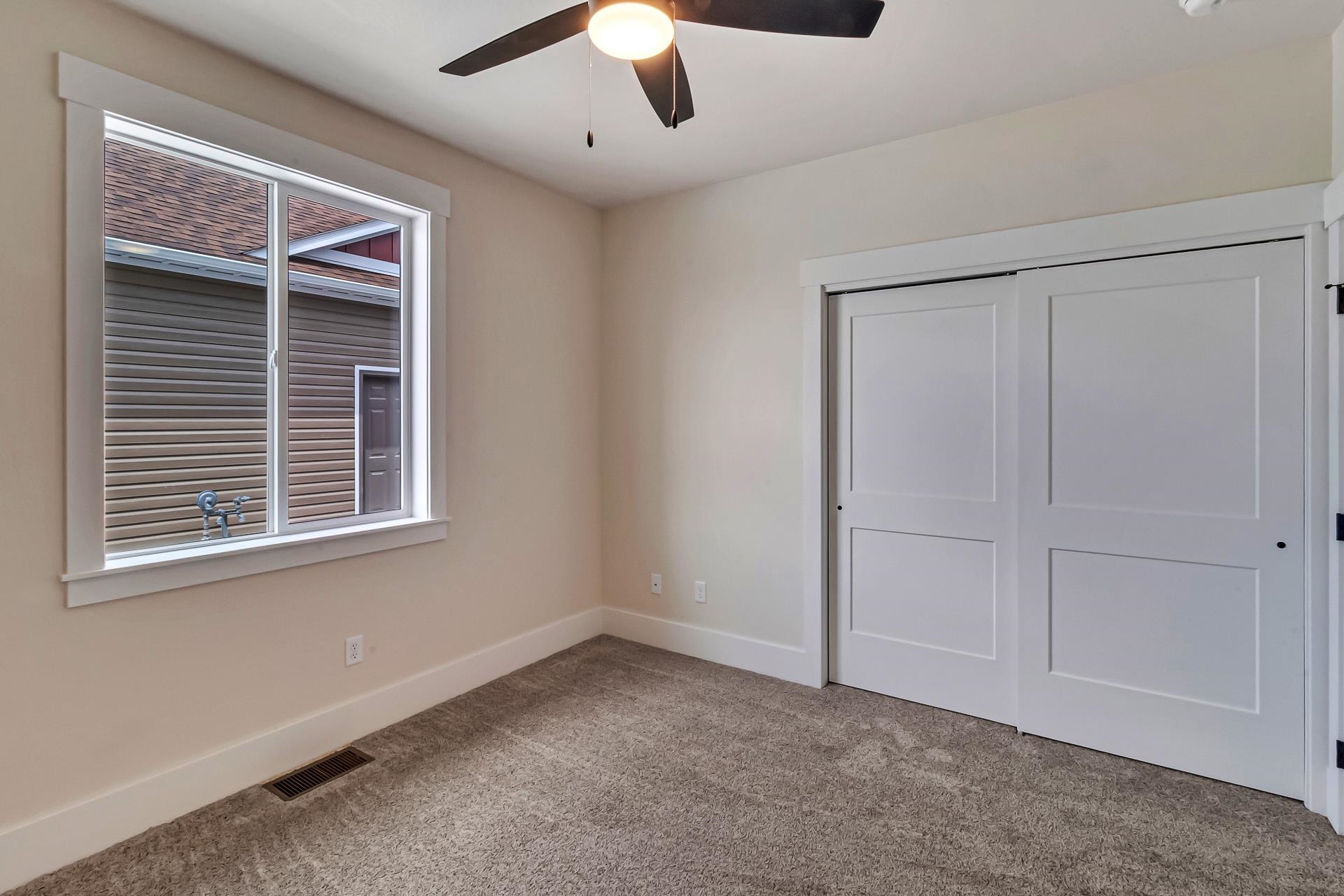 1024 Snowdrop Court Fruita, CO 81521 - Photo 12 of 23 a view of an empty room with a window