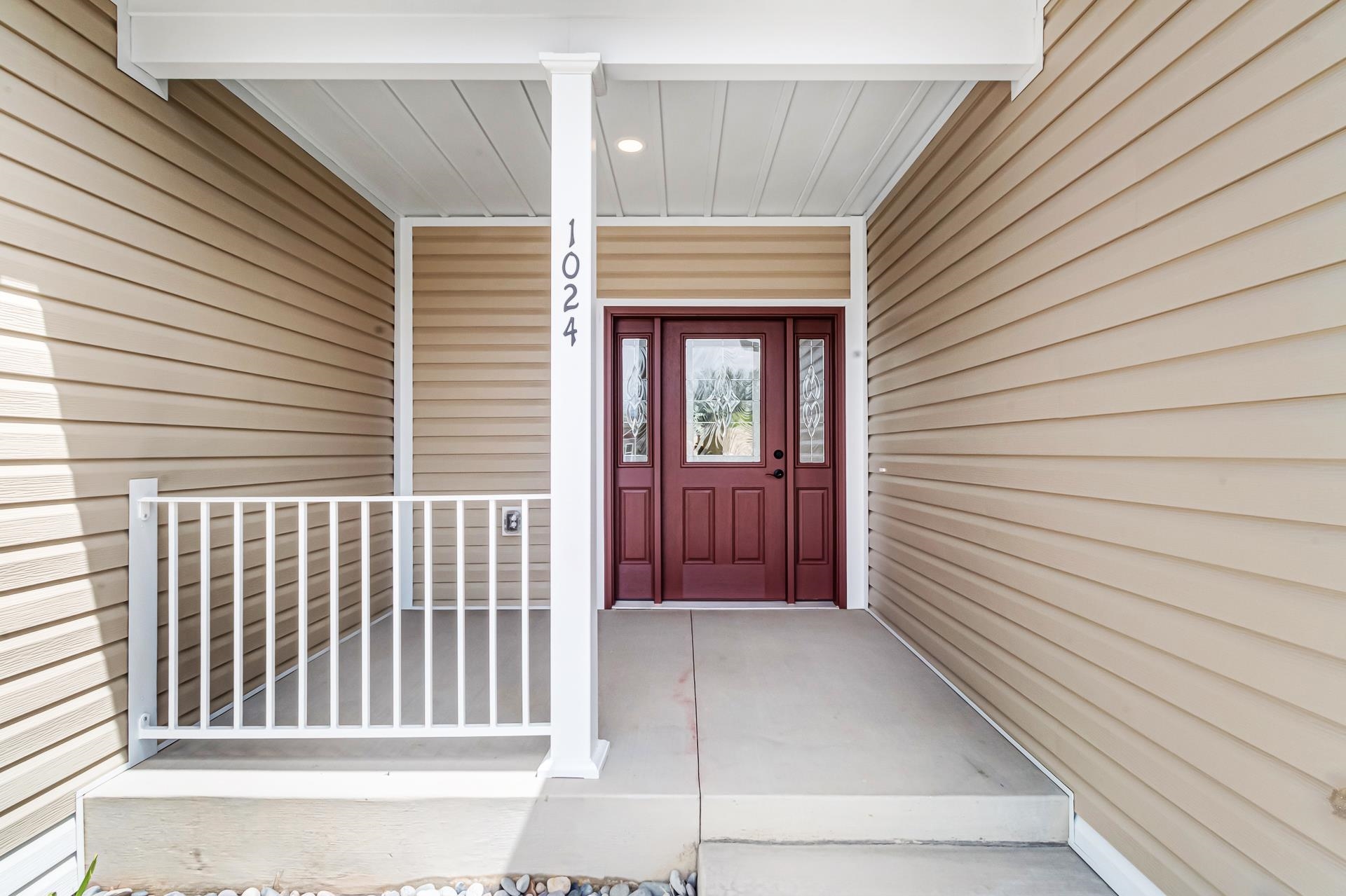 1024 Snowdrop Court Fruita, CO 81521 - Photo 2 of 23 a view of porch with a bench