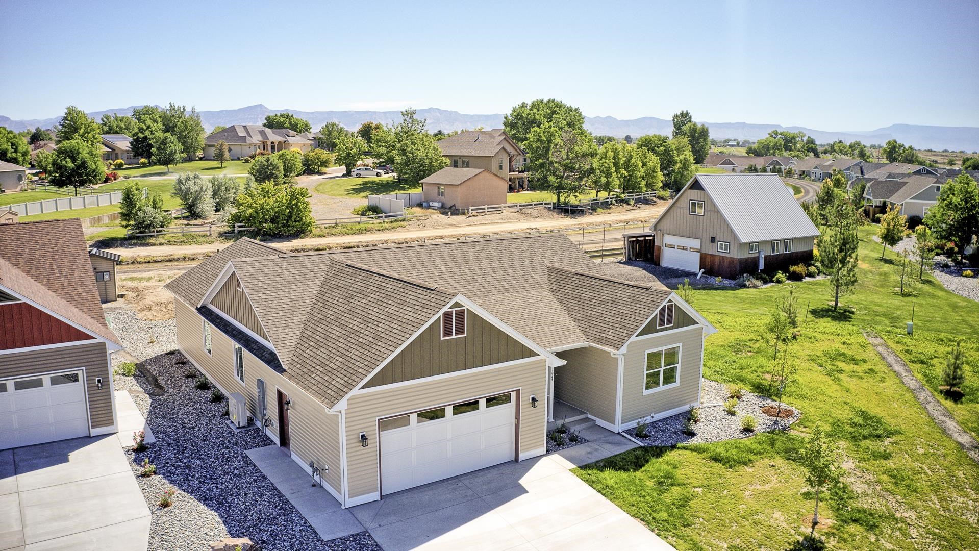 1024 Snowdrop Court Fruita, CO 81521 - Photo 21 of 23 an aerial view of a house with a garden