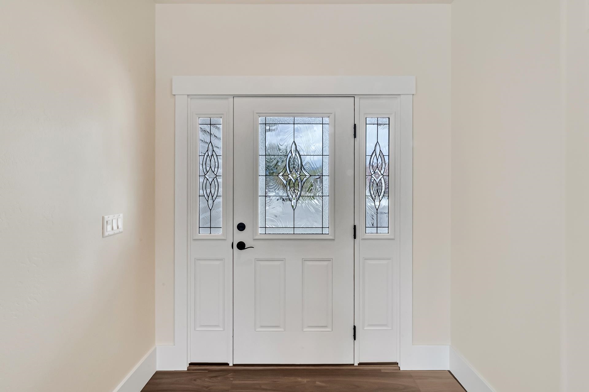 1024 Snowdrop Court Fruita, CO 81521 - Photo 3 of 23 a view of an entryway with wooden floor