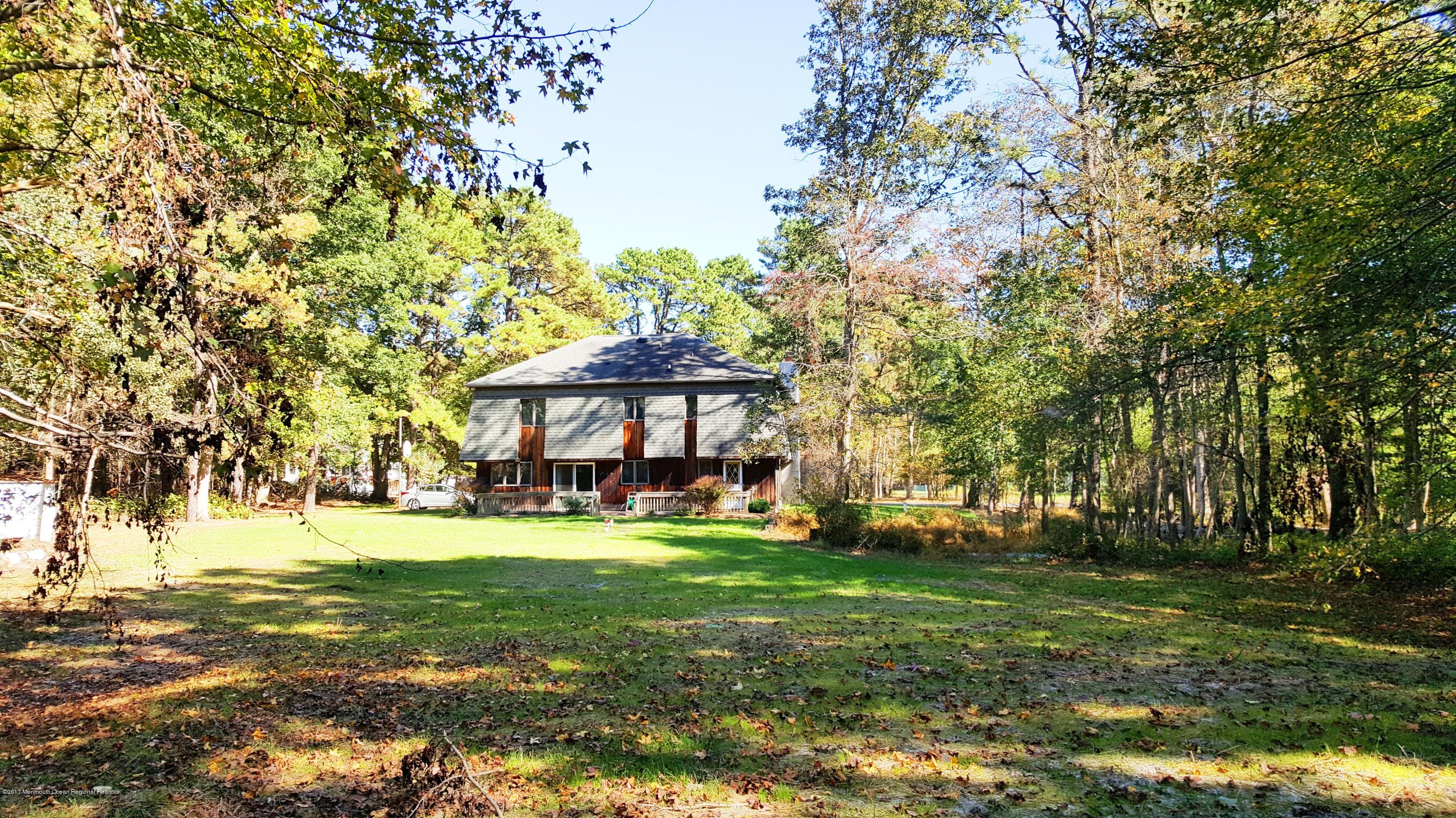 22 Pittenger Pond Road Freehold, NJ 07728 - Photo 3 of 27 22 Pittenger Pond Road Back