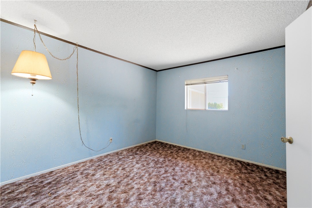 590 Ridgecrest Drive Kingman, AZ 86409 - Photo 18 of 33 a view of a room with a fan