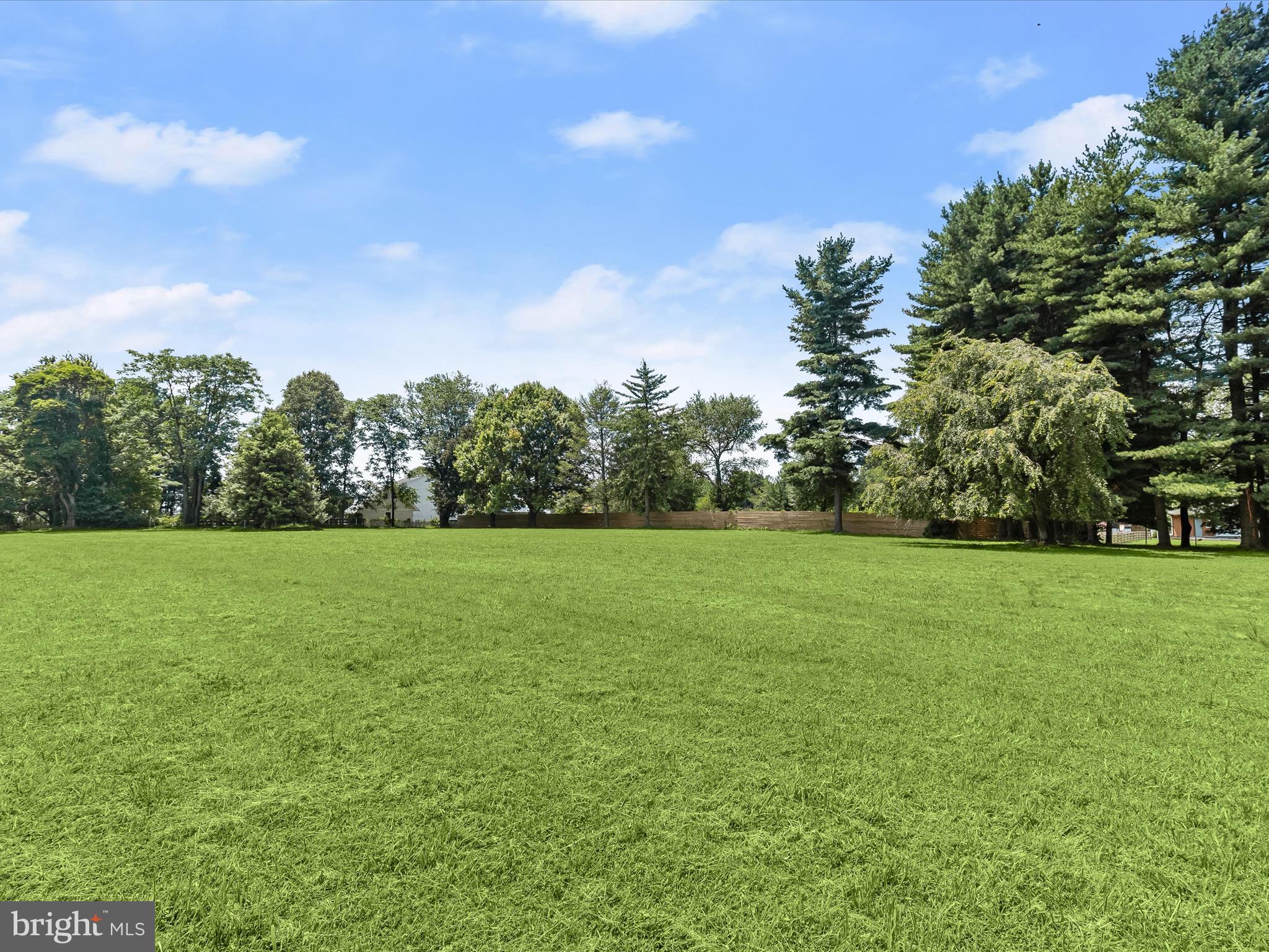 18389 New Cut Road Mount Airy, MD 21771 - Photo 17 of 41 a view of a field of grass and trees