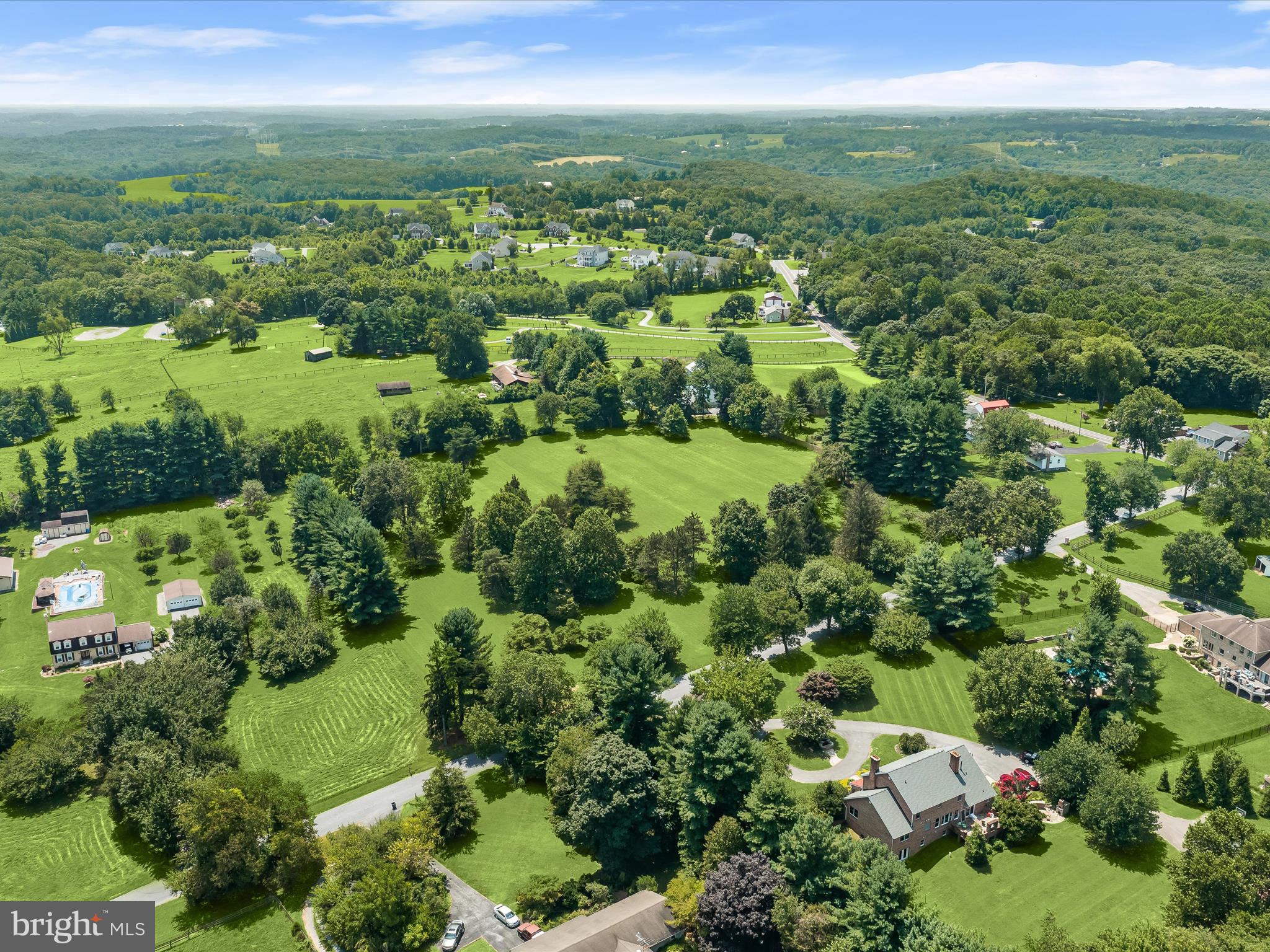 18389 New Cut Road Mount Airy, MD 21771 - Photo 20 of 41 an aerial view of residential houses with outdoor space and trees