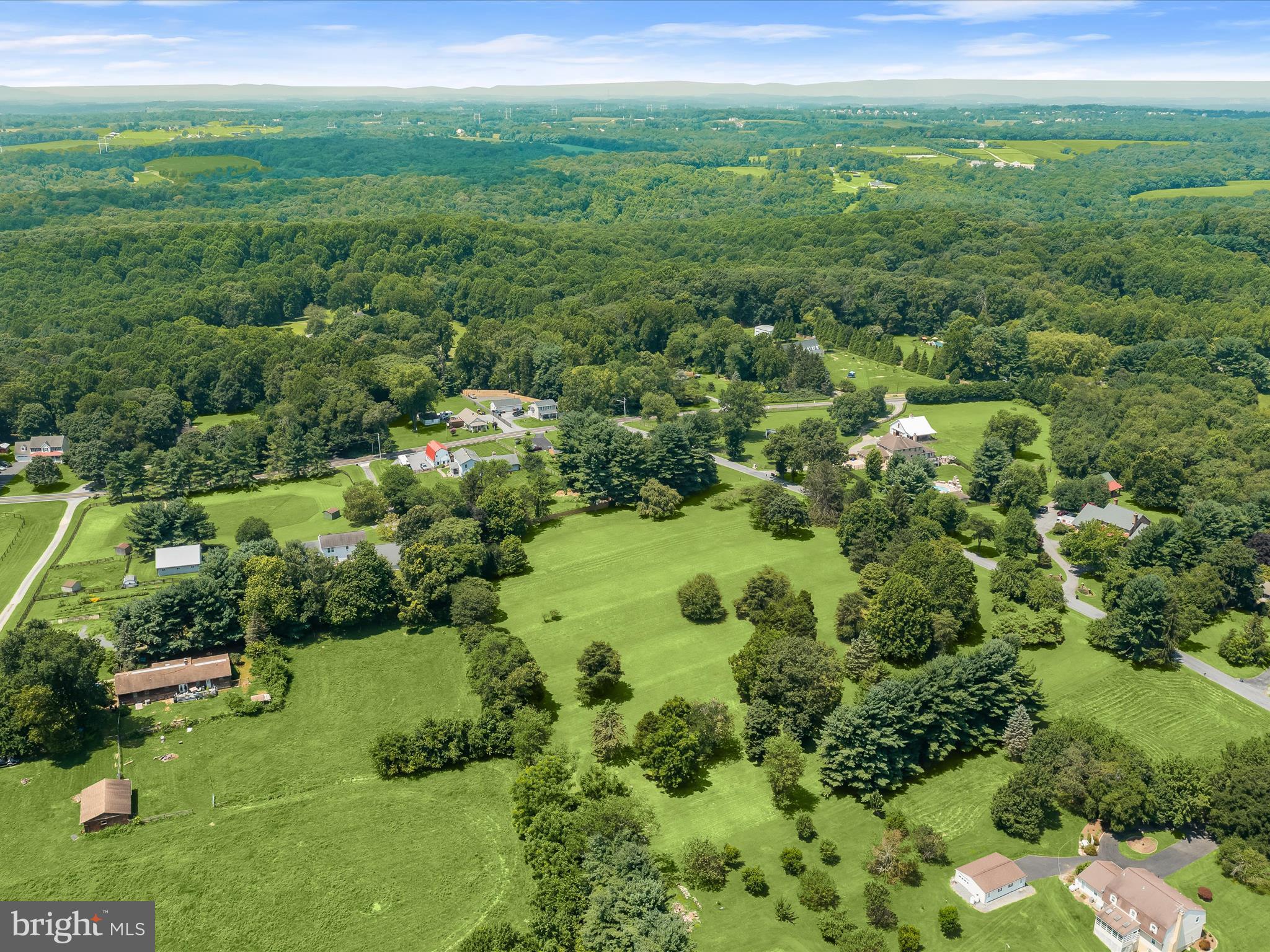 18389 New Cut Road Mount Airy, MD 21771 - Photo 24 of 41 a view of a green field with lots of bushes