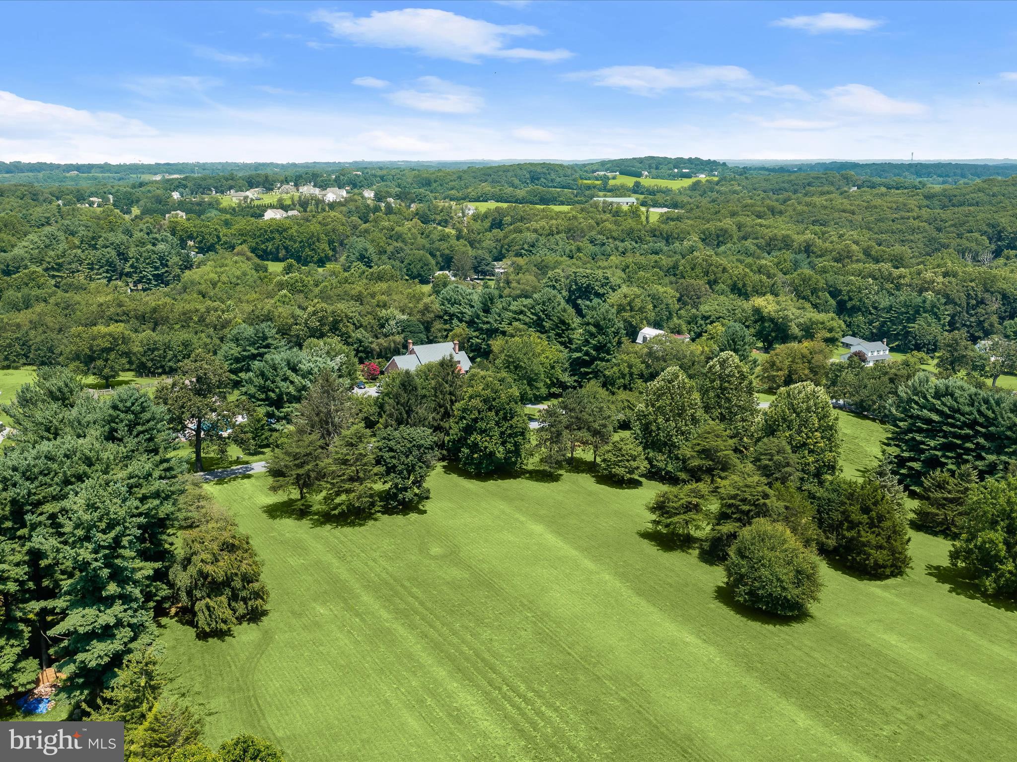 18389 New Cut Road Mount Airy, MD 21771 - Photo 29 of 41 a view of a green field with lots of bushes