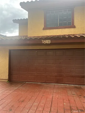 a view of a house with many windows