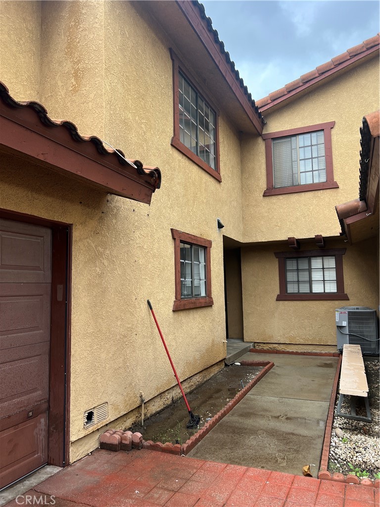 7815 Howe Street, Unit B Paramount, CA 90723 - Photo 20 of 20 a view of a house with many windows