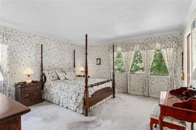 a bed room with a bed and a couch